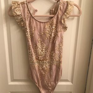 Blush cross back bodysuit